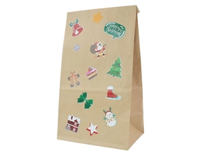 Detail of kraft paper Christmas gift bags with festive stickers and Merry Christmas text