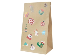 Detail of Christmas kraft paper bag with festive ginger man and Merry Christmas print