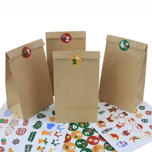DIY Christmas Kraft paper food bags set with festive stickers and advent calendar numbers
