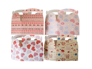 Detail view of four Valentine's Day gift boxes with heart patterns and I LOVE YOU text