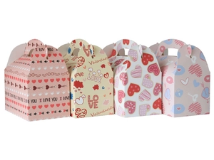 Detailed view of four colorful Valentine's Day themed paper gift boxes with heart patterns