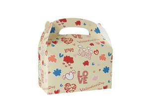 Detail of a Valentine's Day themed candy gift box with heart prints and sturdy handles