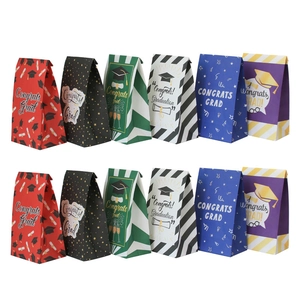 Set of 12 graduation party paper gift bags with Congrats Grad cap and diploma designs