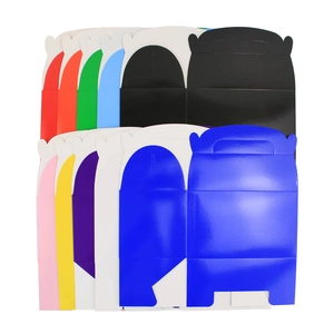 Flat colorful gift boxes with handles in various colors for party favors and candy packaging