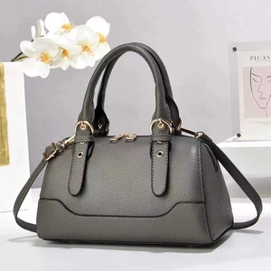 Large dark grey lychee leather Boston pillow handbag with gold zippers and handles