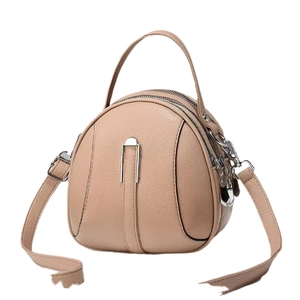 Three-layer nude pink round crossbody bag in lychee leather with silver hardware zippers