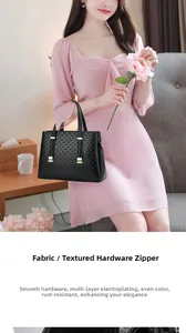 Détails du sac à main noir en cuir embossé avec fermeture éclair dorée antirouille de luxe