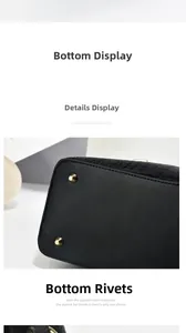 Détail du fond du sac à main noir montrant les rivets dorés et les coutures précises