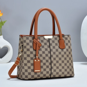 Classic checkered tote bag with brown leather handles and gold buckle detail
