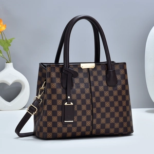 Brown checkered leather tote bag with vintage floral patterns and gold hardware