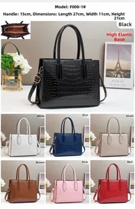 Detail view of glossy stone texture tote bag in multiple colors with dimension specs