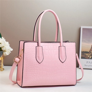 Pink crocodile pattern handbag with top handles and adjustable shoulder strap for women