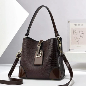 Vintage dark brown faux croc leather bucket bag with top handle and gold hardware