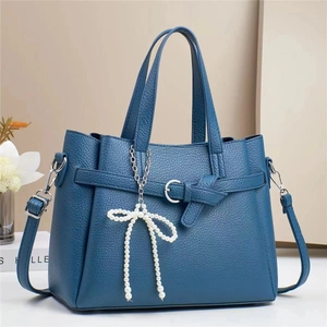 Blue lychee pattern handbag with pearl bow pendant and silver hardware detail
