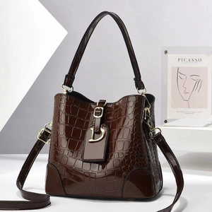 Retro dark brown crocodile pattern bucket handbag with golden D-ring pendant and strap