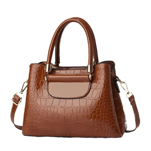 Brown crocodile pattern faux leather handbag with top handles and adjustable shoulder strap