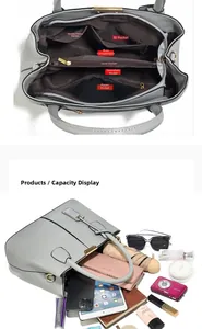 Detail view of large grey tote bag interior with multiple functional compartments and pockets