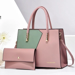 Detail of pink and green leather tote bag with gold hardware and K.ELEGANCE logo