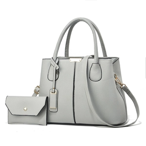 Minimalist light grey tote bag set with pebble texture and matching coin purse