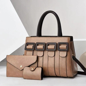 Dettaglio del set di borse tre pezzi con borsa a mano e portafogli coordinati