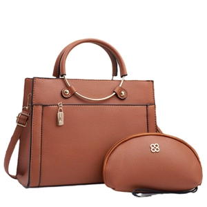 Caramel brown pebbled leather handbag set with gold circular handles and flower logo charm