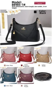 Detail view of lychee leather shoulder bag with six colors and dual compartment dimensions