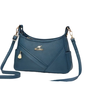Dark blue pebbled leather shoulder bag with adjustable strap and golden hardware