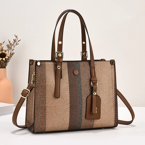 Large capacity color-block canvas tote bag with leather trim and adjustable shoulder strap