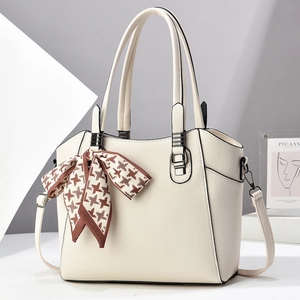 Chic beige lychee leather tote bag with houndstooth scarf and silver hardware detail
