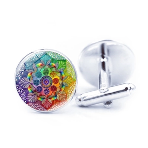 Silver cufflinks featuring a colorful mandala pattern under a round glass dome cover