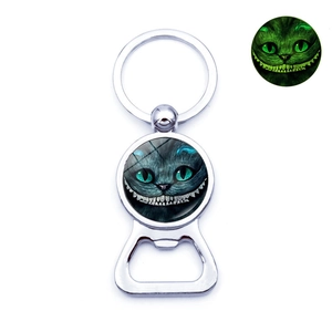 Luminous Cheshire Cat bottle opener keychain with glowing green glass cabochon pendant