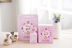 Sacchetti e scatole regalo rosa per Baby Shower con motivi a polipo per feste di bambine