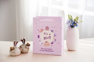 Sacchetto regalo rosa per Baby Shower con disegni di polpo e manici in nastro di seta