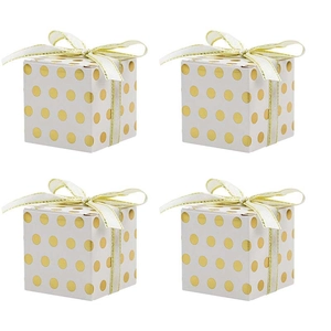 Set of four white square candy boxes with gold polka dots and elegant ribbon bows