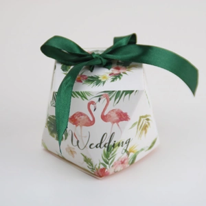 Elegant octagonal wedding favor box with pink flamingo and green ribbon closure