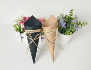 Detail of square kraft paper cone for bouquets with jute twine and decorative label