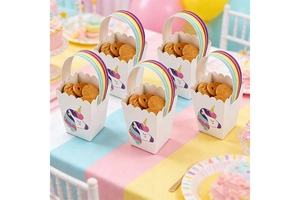 Five unicorn gift bags with rainbow handles and wavy edges for children party favors
