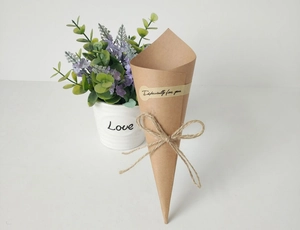 Detail of kraft paper cone flower wrap with twine bow and Especially for you sticker