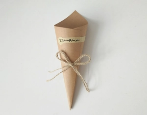 Close-up of kraft paper bouquet cone with hemp rope and Especially for you sticker