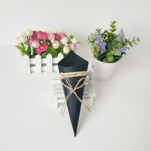 Cone-shaped black kraft paper gift wrap for mini bouquets with jute twine and sticker