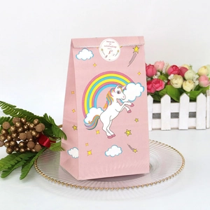 Pink unicorn paper food bag with rainbow design and round sealing sticker for parties