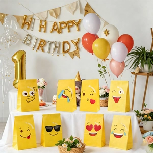 Yellow cartoon emoji paper gift bags for birthday parties and snacks in a festive setting