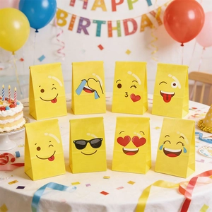Set of 8 yellow emoji paper gift bags for birthday parties and snack packaging
