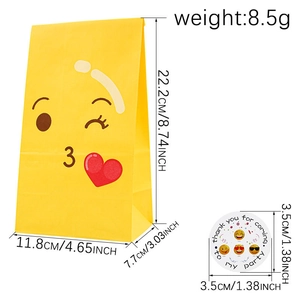 Yellow emoji paper gift bag with winking face and sealing sticker for party favors