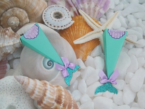 Detail of mermaid candy box with purple bow, glitter tail and Thank You shell sticker