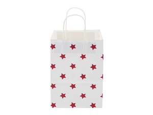 Detail view of a white paper gift bag featuring red star patterns and sturdy white handles
