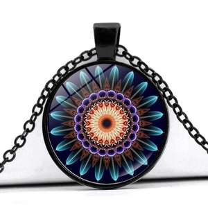 Detail of Mandela glass dome necklace showing intricate geometric patterns and black chain