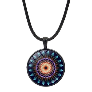 Close-up of a circular mandala pendant necklace featuring vibrant geometric patterns