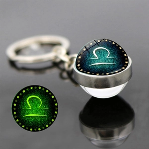 Luminous Libra constellation keychain featuring a double-sided glass ball and starry glow