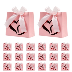 Set of 20 pink gift bags with double heart cut-outs and soft pink satin ribbons